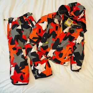 Mini-Biden snow suit with stars pattern and high visibility colors